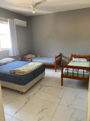 Edificio America - Apartamento amplo e 2 quadras da praia